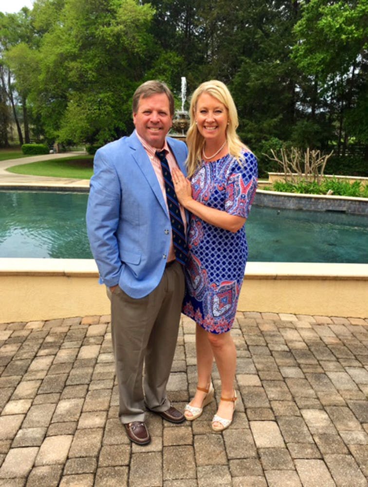 Coach Jim McElwain and Karen McElwain before attending Easter Sunday service last month. The McElwains have been in Gainesville for a year now, with a 10-4 regular season record in their first season with the Gators.