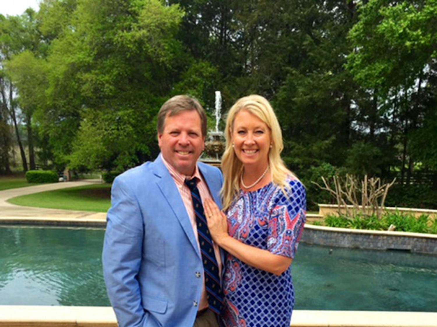 Coach Jim McElwain and Karen McElwain before attending Easter Sunday service last month. The McElwains have been in Gainesville for a year now, with a 10-4 regular season record in their first season with the Gators.