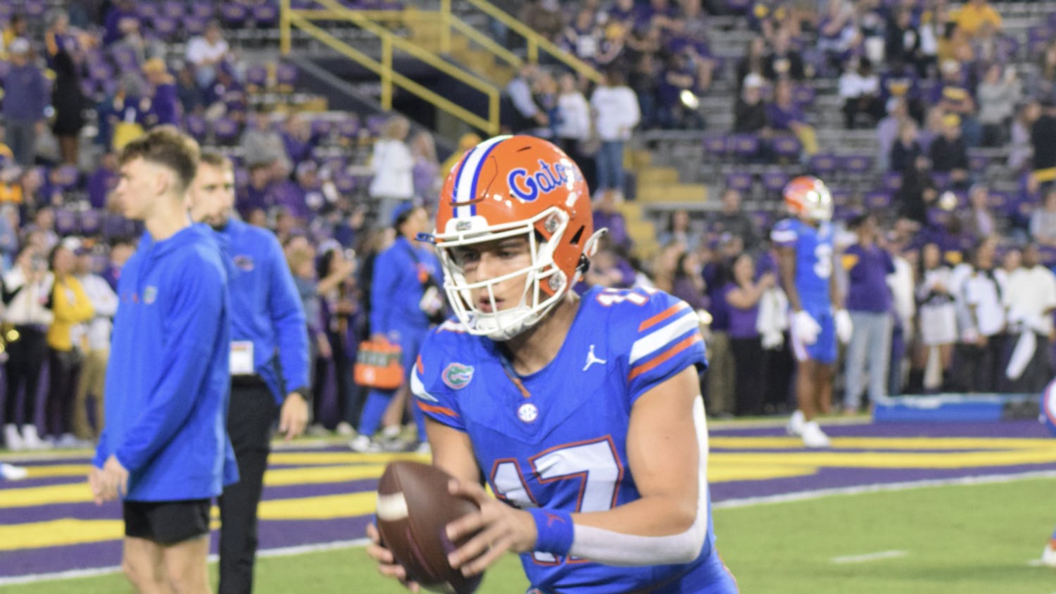 Redshirt freshman quarterback Max Brown warms up before the Gators' 52-35 loss to the LSU Tigers on Saturday, Nov. 11, 2023.