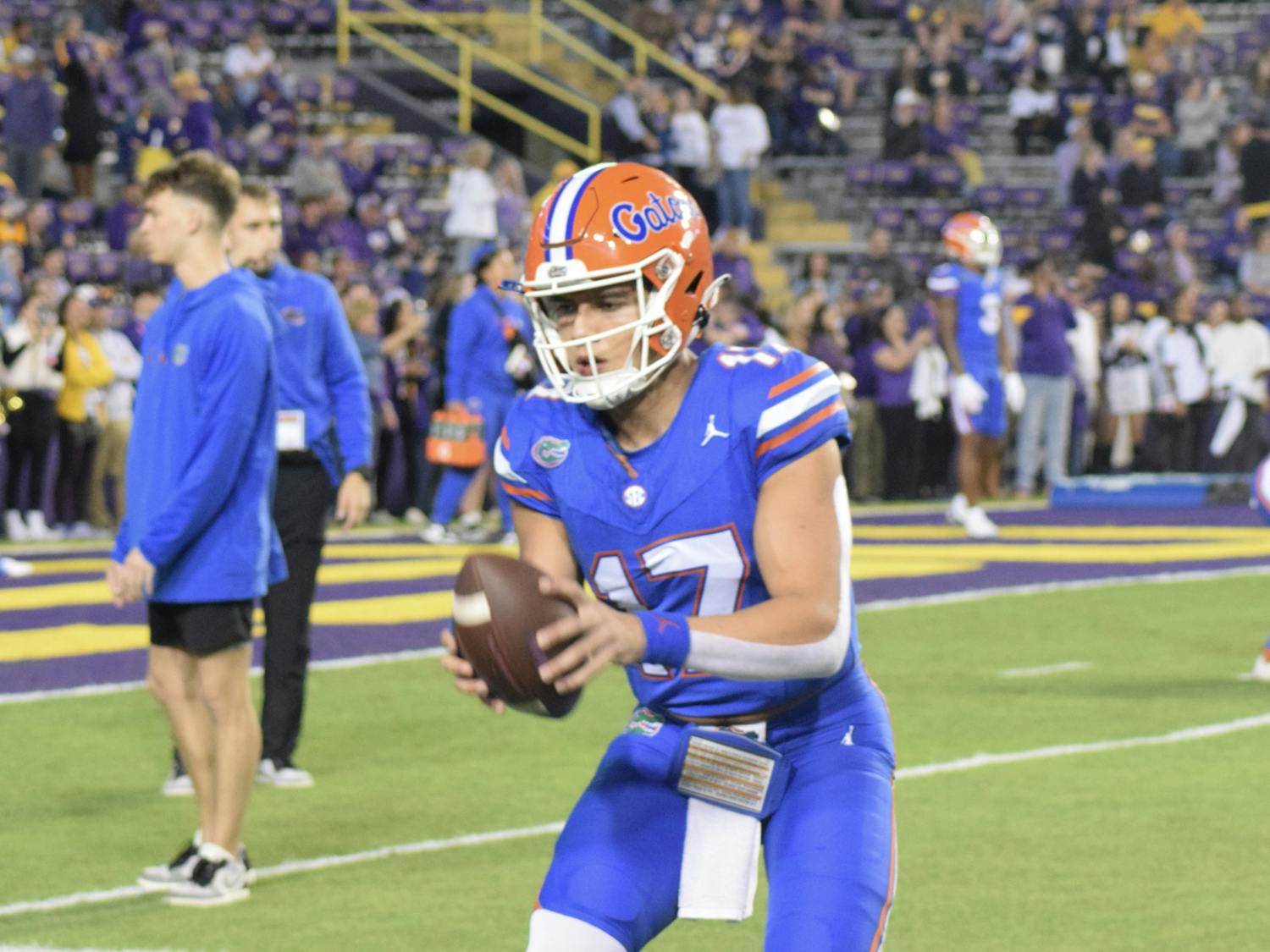 Redshirt freshman quarterback Max Brown warms up before the Gators' 52-35 loss to the LSU Tigers on Saturday, Nov. 11, 2023.