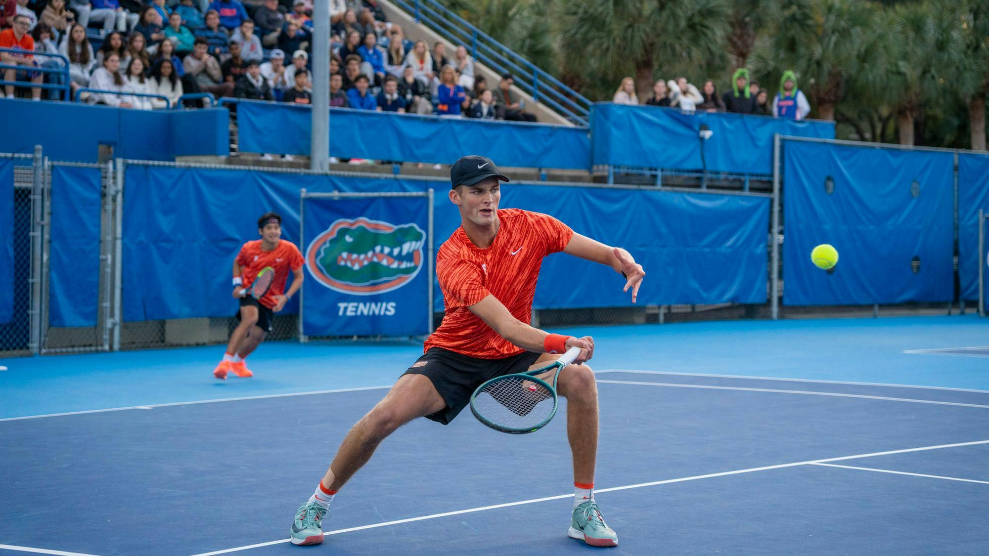 Florida’s Henry Johnson returns the ball during an NCAA men's doubles tennis match against Florida State in Gainesville, Fla.&nbsp;Friday, Jan 30, 2026.