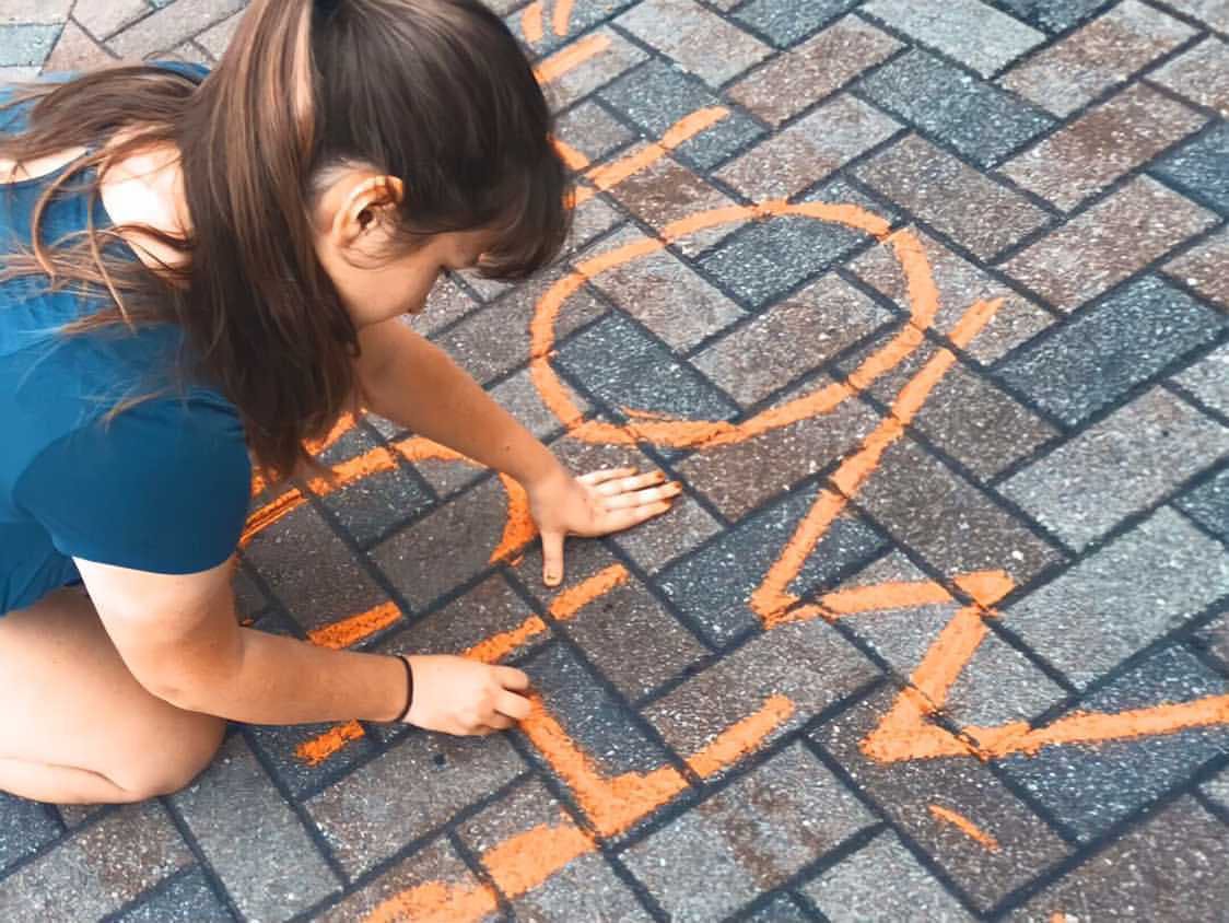 The organization chalks messages on the sidewalks of Gainesville to raise awareness about street harassment. 