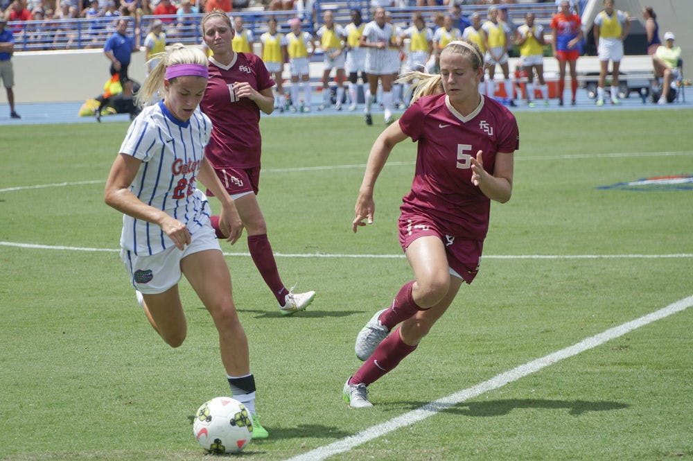 <p>UF defender Christen Westphal dribbles the ball during Florida's 3-2 win against Florida State on Aug. 30, 2015, at James G. Pressly stadium.</p>