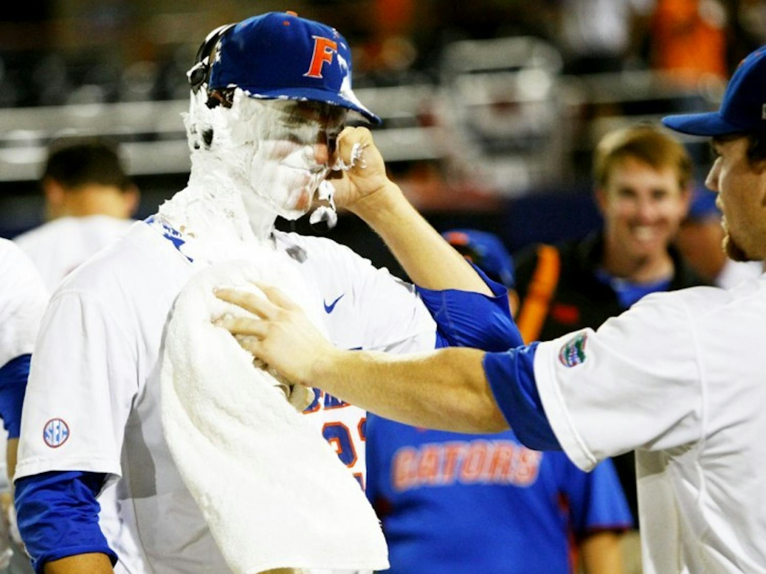 Sophomore Jonathon Crawford reacts after teammates threw a pie in his face following his no-hitter against Bethune-Cookman in the NCAA Gainesville Regional opener June 1.