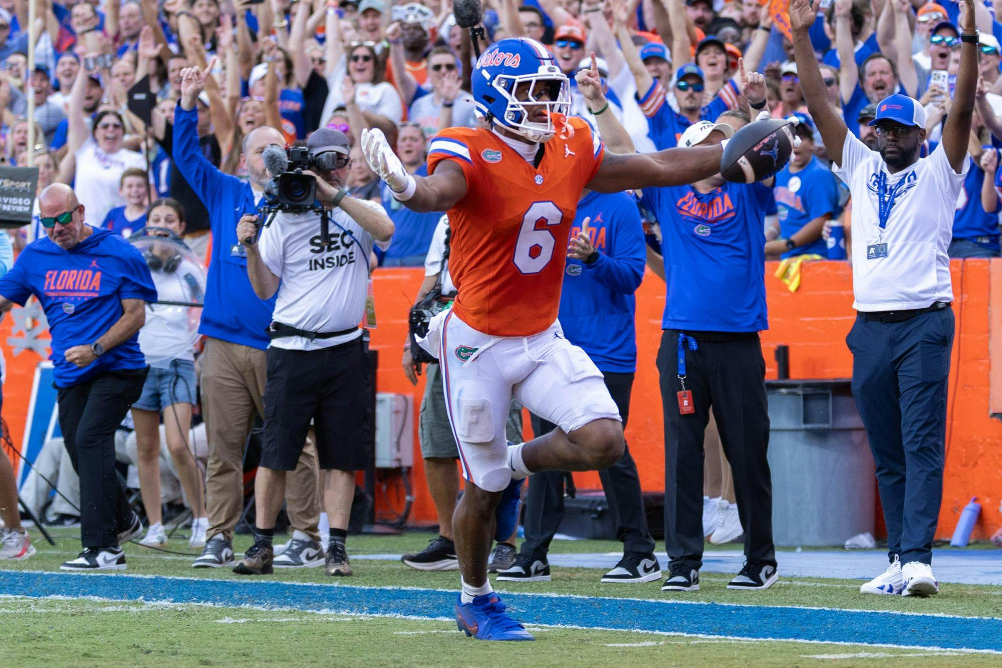 Florida wide receiver Dallas Wilson (6) scores a touchdown in the first half of an NCAA college football game against Campbell, Saturday, Sept. 12, 2026, in Gainesville, Fla.