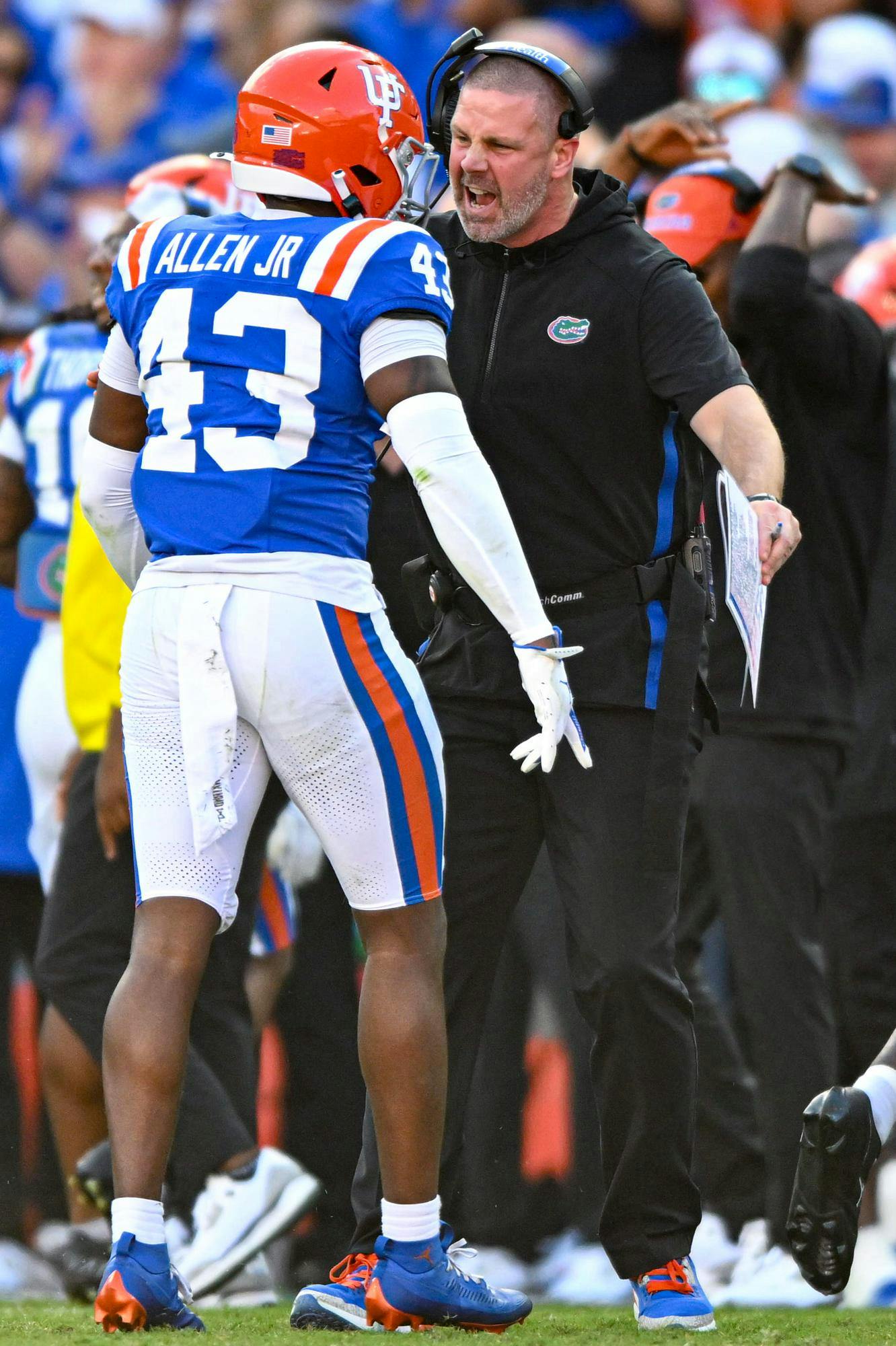 Florida Gators head coach Billy Napier hypes up defensive back Alfonzo Allen Jr. (43) in a NCAA college football game, Saturday, Oct. 18, 2025, in Gainesville, Fla.