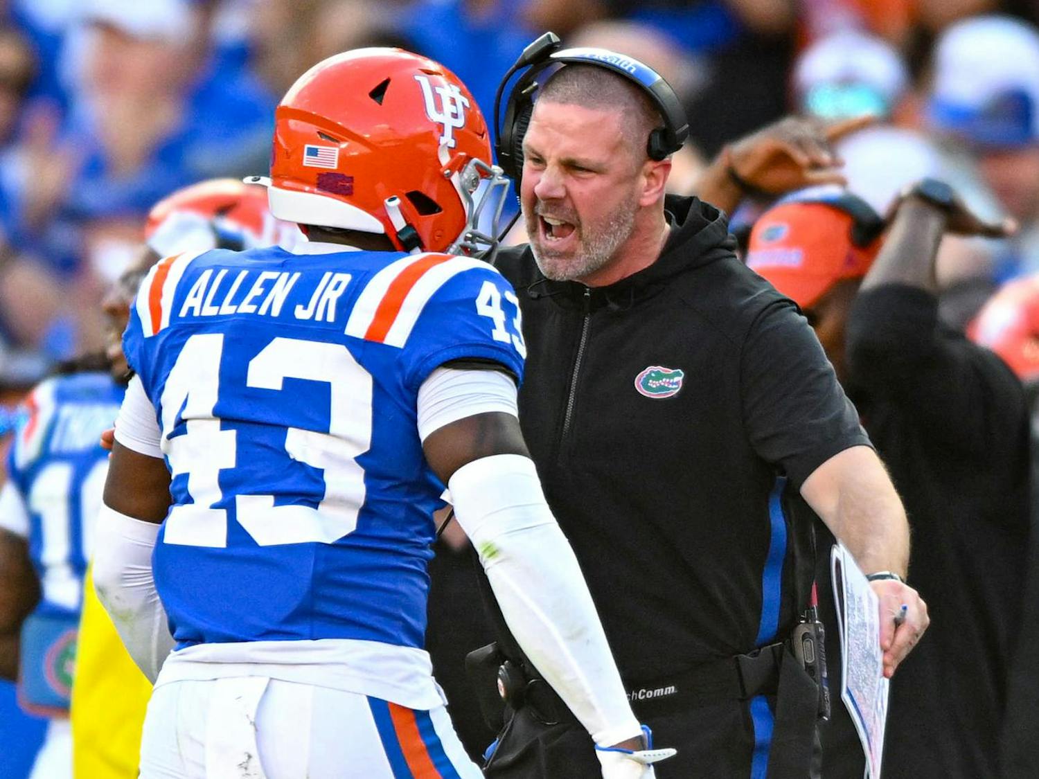 Florida Gators head coach Billy Napier hypes up defensive back Alfonzo Allen Jr. (43) in a NCAA college football game, Saturday, Oct. 18, 2025, in Gainesville, Fla.
