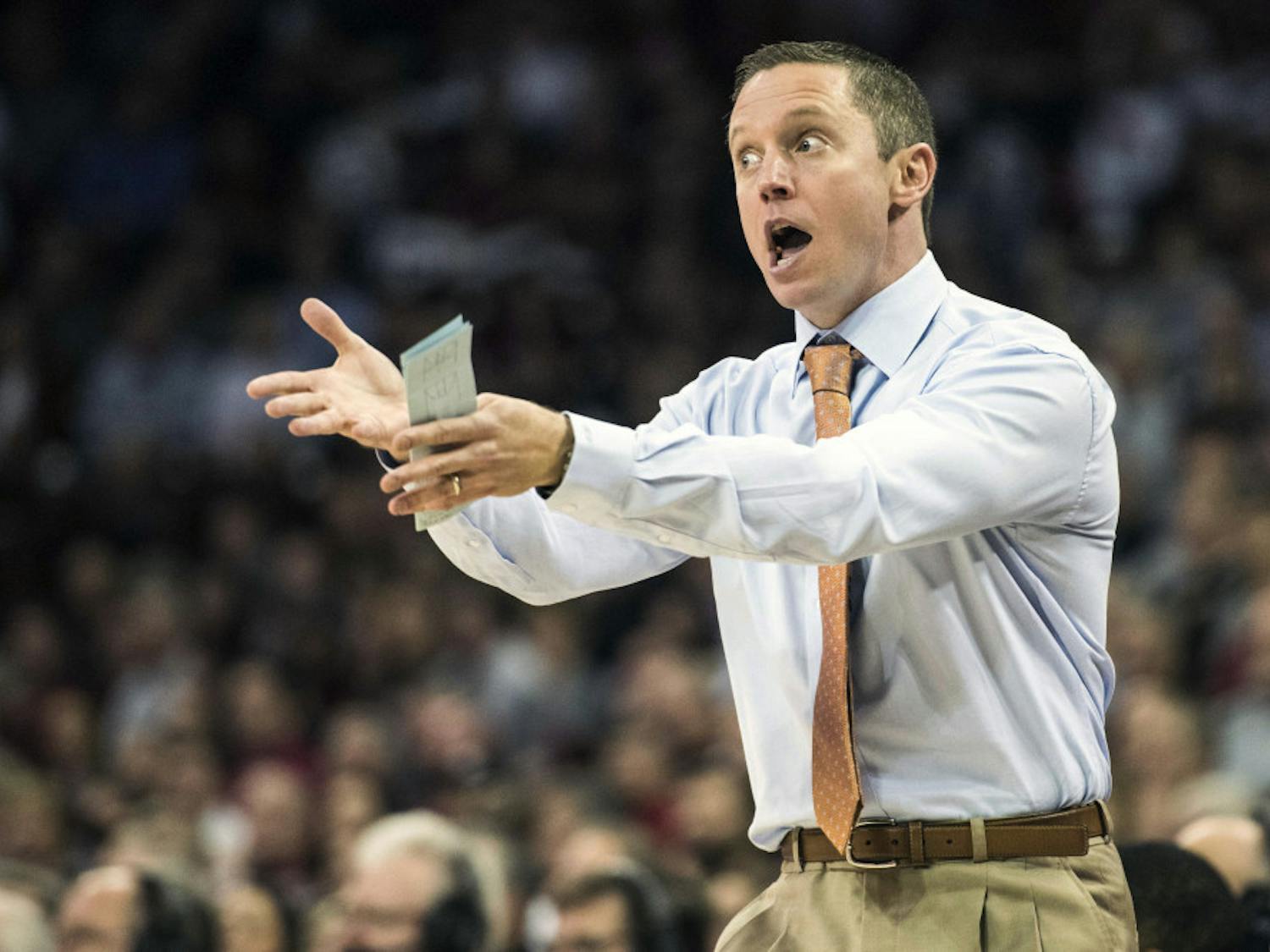 Florida head coach Mike White communicates with players during the first half of an NCAA college basketball game against South Carolina Wednesday, Jan. 18, 2017, in Columbia, S.C. (AP Photo/Sean Rayford)