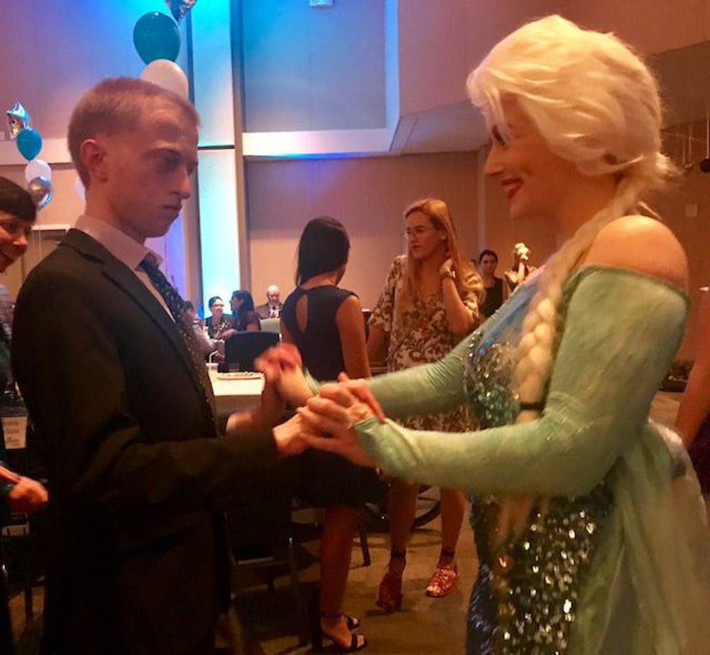 <p><span>Guest David Ison is dancing with Jeana Fraser, UF sophomore serving with Project Princess as Queen Elsa.</span></p>