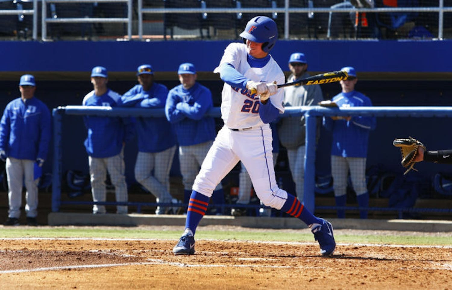 Senior center fielder Cody Dent swings during Florida’s 16-5 win against Duke on Feb. 17 at McKethan Stadium. Dent hit his first career home run against Florida A&amp;M on Monday.
