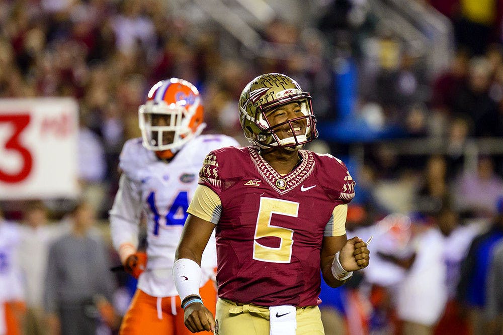FSU quarterback Jameis Winston celebrates during Florida's 24-19 loss to Florida State on Saturday at Doak Campbell Stadium in Tallahassee.