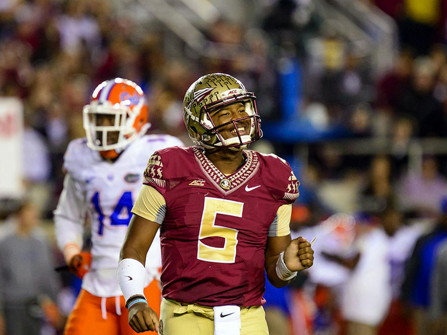 FSU quarterback Jameis Winston celebrates during Florida's 24-19 loss to Florida State on Saturday at Doak Campbell Stadium in Tallahassee.
