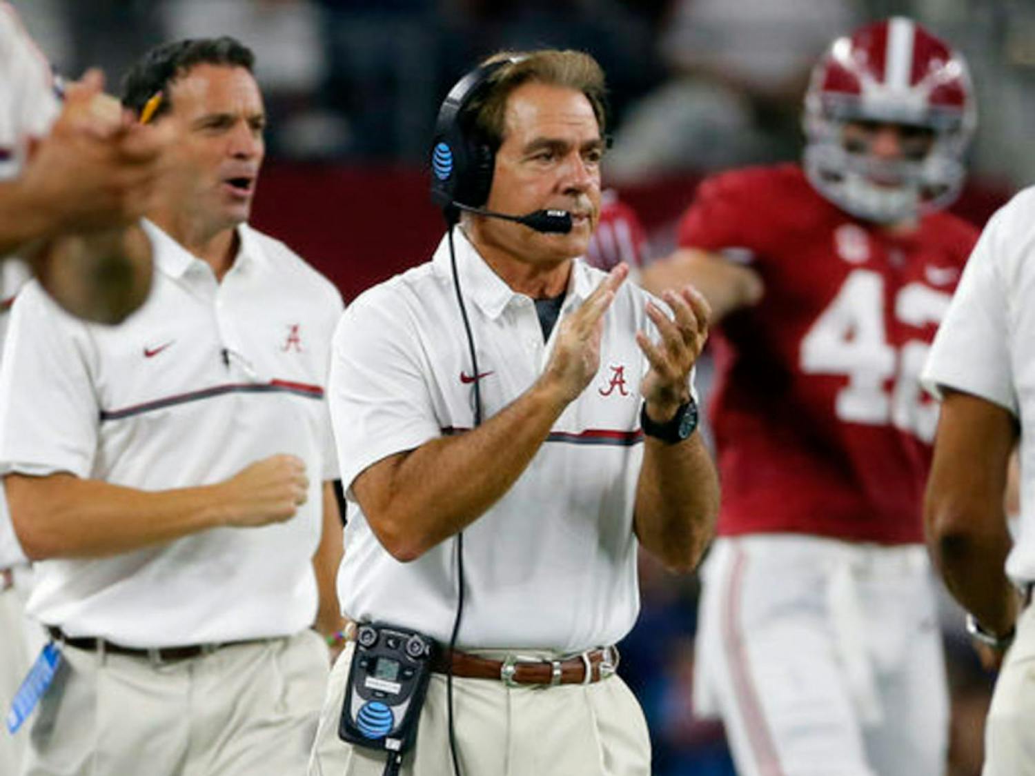 Alabama coach Nick Saban applauds on the sideline during the first half of an NCAA college football game against Southern California on Saturday, Sept. 3, 2016, in Arlington, Texas. (AP Photo/Tony Gutierrez)