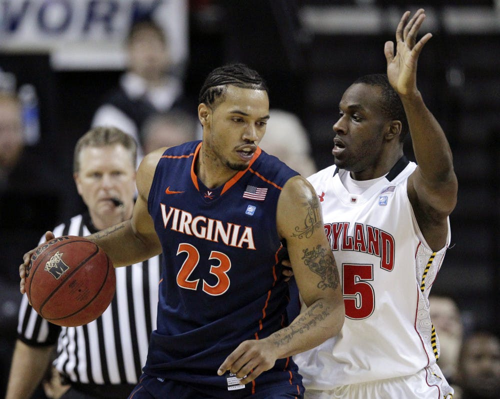 <p>Virginia senior forward Mike Scott (left) is averaging 18.1 points per game and was named the ACC’s runner-up for Player of the Year.</p>
