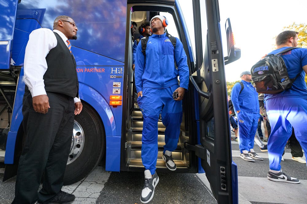 Florida quarterback DJ Lagway (2) walks off the team bus before an NCAA college football game, Saturday, Nov. 22, 2025, in Gainesville, Fla.