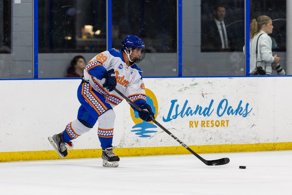 Michael McCoy slaps the puck during the Gators' match against the ERAU Eagles on Sunday, September 7, 2025 at Community First Igloo in Jacksonville, Fla. / Photo by Ryan Friedenberg