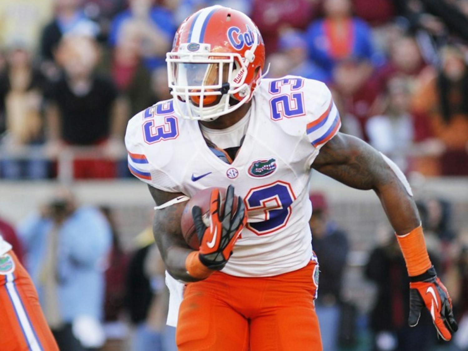 Running back Mike Gillislee runs the ball into the endzone during a 37-26 win against Florida State at Doak Cambell Stadium in Tallahasse, Fla.
