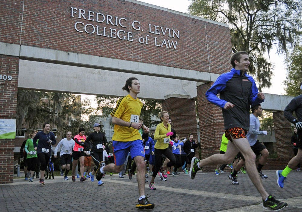 <p>Matt Antworth, right, runs in the ELULS Eco Run on Saturday with his roommate, 21-year-old education junior Jack Krasny. Antworth, a 21-year-old mechanical engineering junior, said he’s using this race and Delta Epsilon Psi’s Dash For Diabetes 5K to warm up and get back in shape.</p>