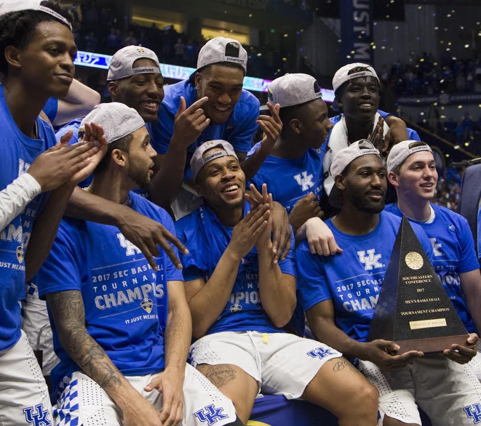 Kentucky players celebrate after the Wildcats won the Southeastern Conference Tournament on March 12, 2017, in Nashville, Tennessee.