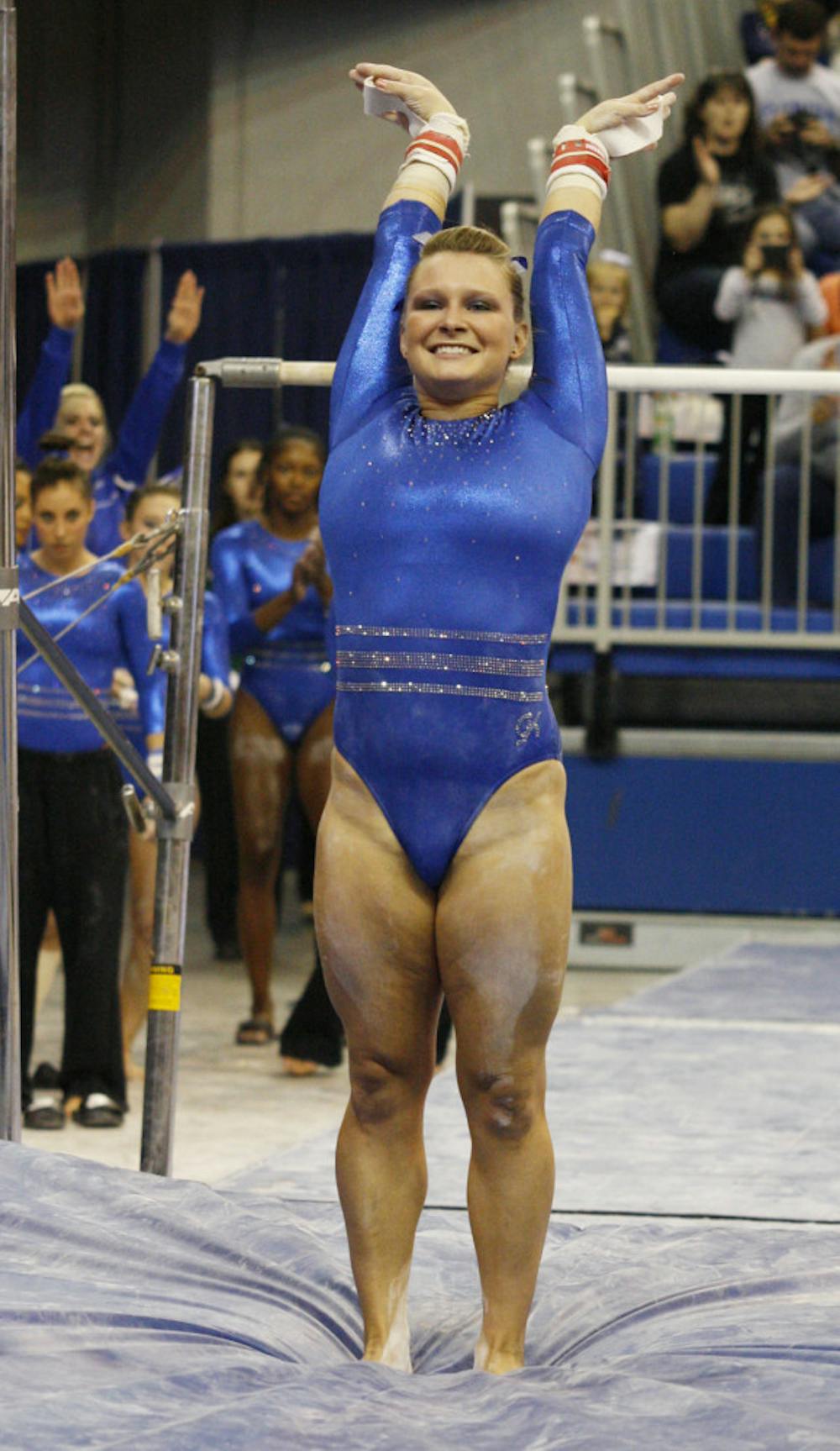 <p>Freshman Bridget Sloan sticks a landing during Florida’s 196.575-190.55 win against Ball State on Jan. 4 in the O’Connell Center.</p><div> </div>