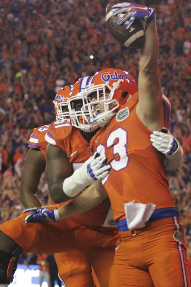 UF tight end Jake McGee celebrates after scoring UF's second touchdown of the game during the Gators' 38-10 win over Ole Miss on Oct. 3, 2015, at Ben Hill Griffin Stadium.
