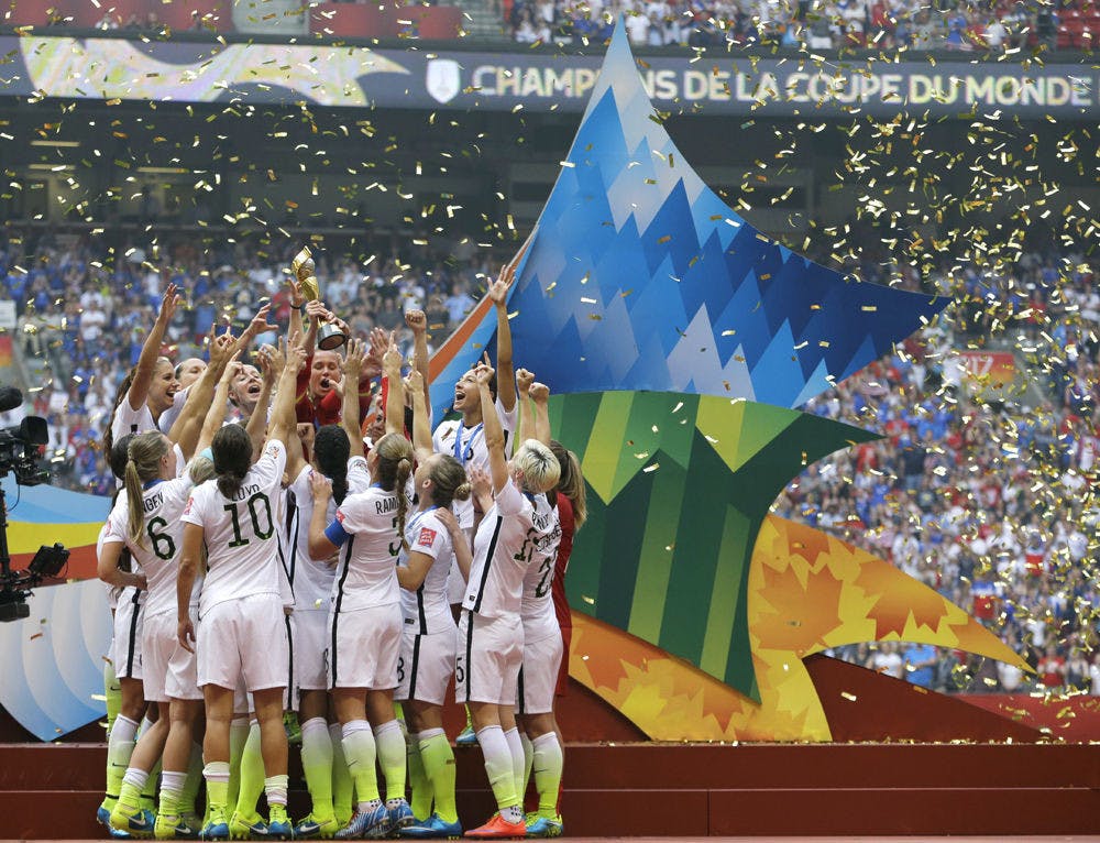 <p>The United States Women's National Team celebrates with the trophy as confetti falls after they beat Japan 5-2 in the FIFA Women's World Cup soccer championship in Vancouver, British Columbia, Canada on July 5, 2015.</p>