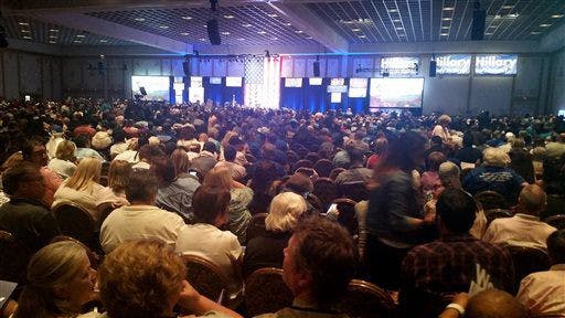 Thousands of people gather at the Paris casino in Las Vegas for the Nevada State Democratic Convention on Saturday, May 14, 2016. They are picking delegates to send to the national convention in July. (AP Photo/Michelle Rindels)
