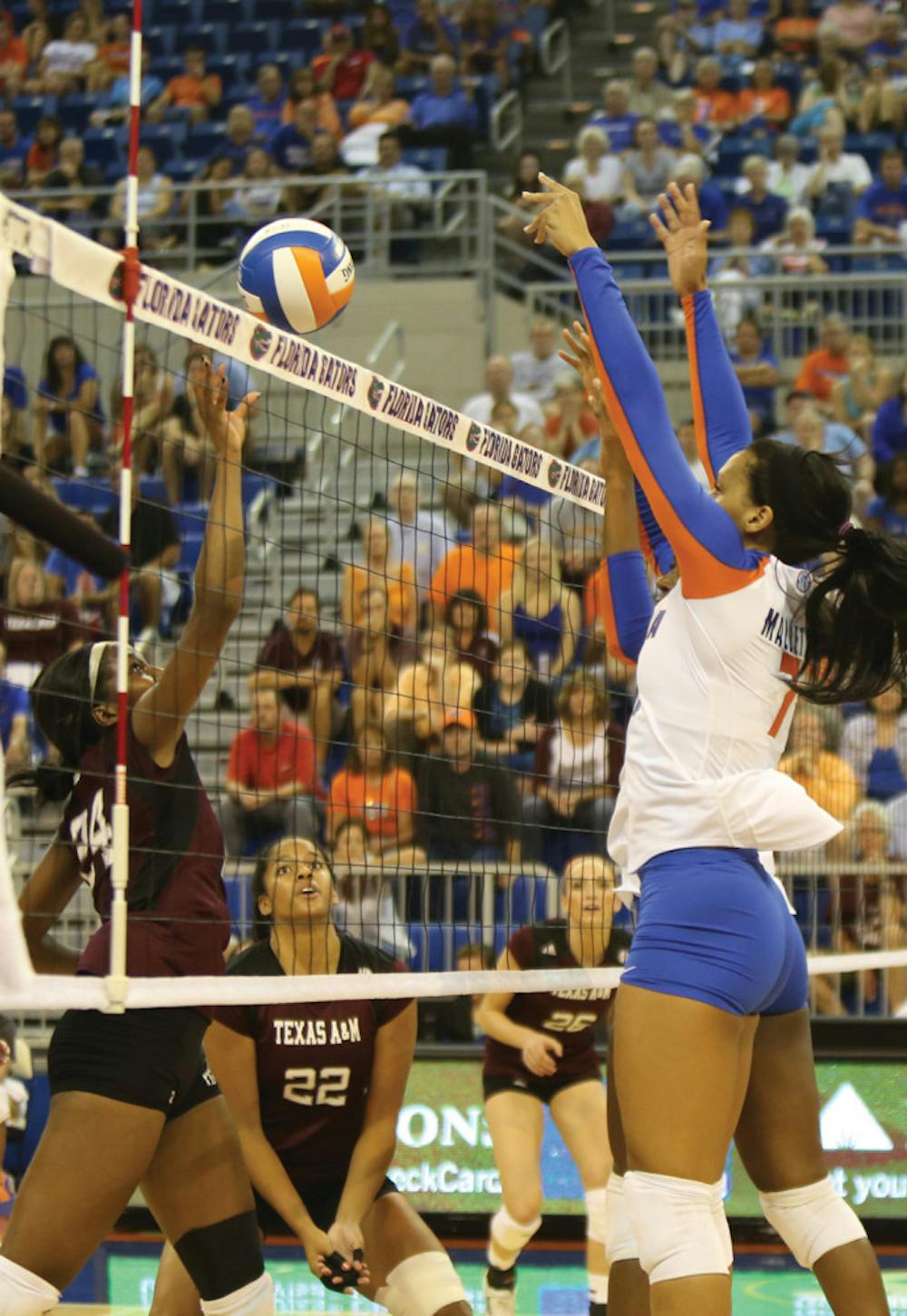 <p>Gabby Mallette blocks the ball during UF’s win against Texas A&amp;M on Oct. 4 in the O’Connell Center.</p>