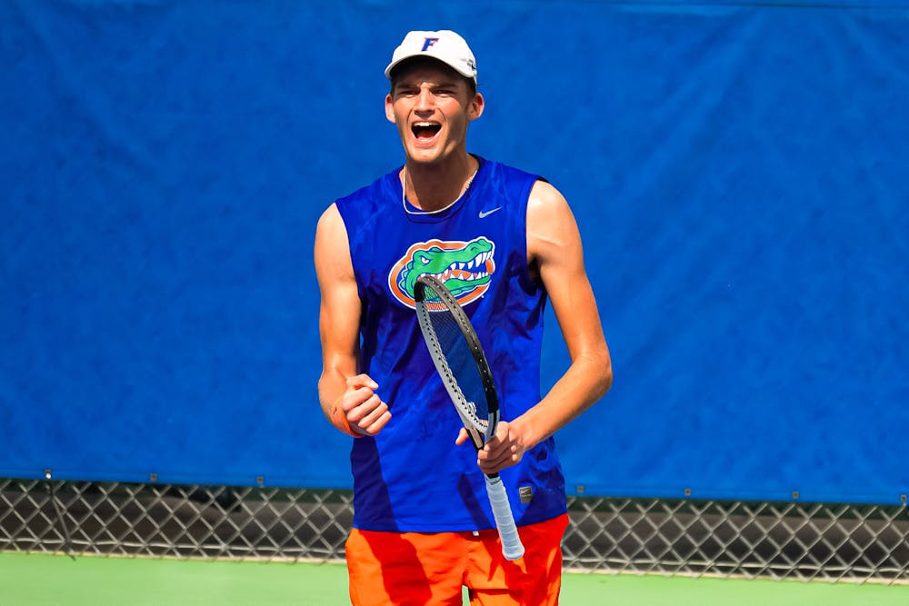 <p>UF tennis player Henry Jefferson celebrates during a match against the University of North Florida on Saturday, Feb. 15, 2025.</p>