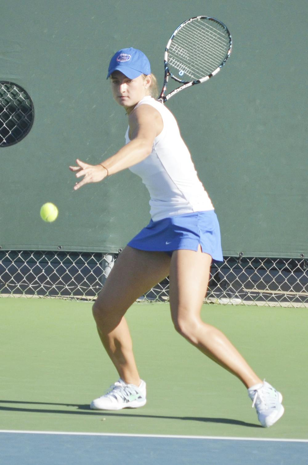 <p>Kourtney Keegan swings at the ball on Oct. 11,2013 at the Bedford Cup at the Ring Tennis Complex.</p>