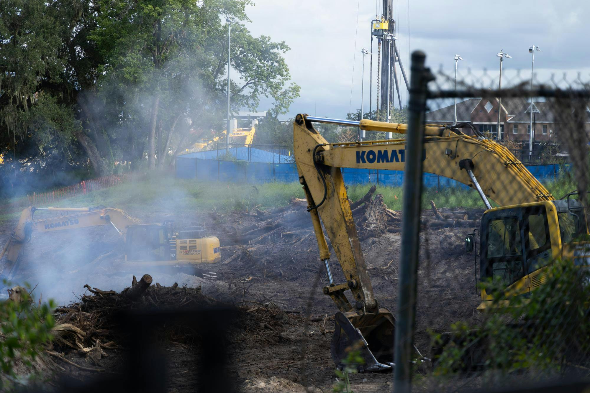 A grapple excavator stands still at the site of the stump burnings, Thursday, Sept. 3, 2026, near Keys Complex on UF’s campus in Gainesville, Fla.
