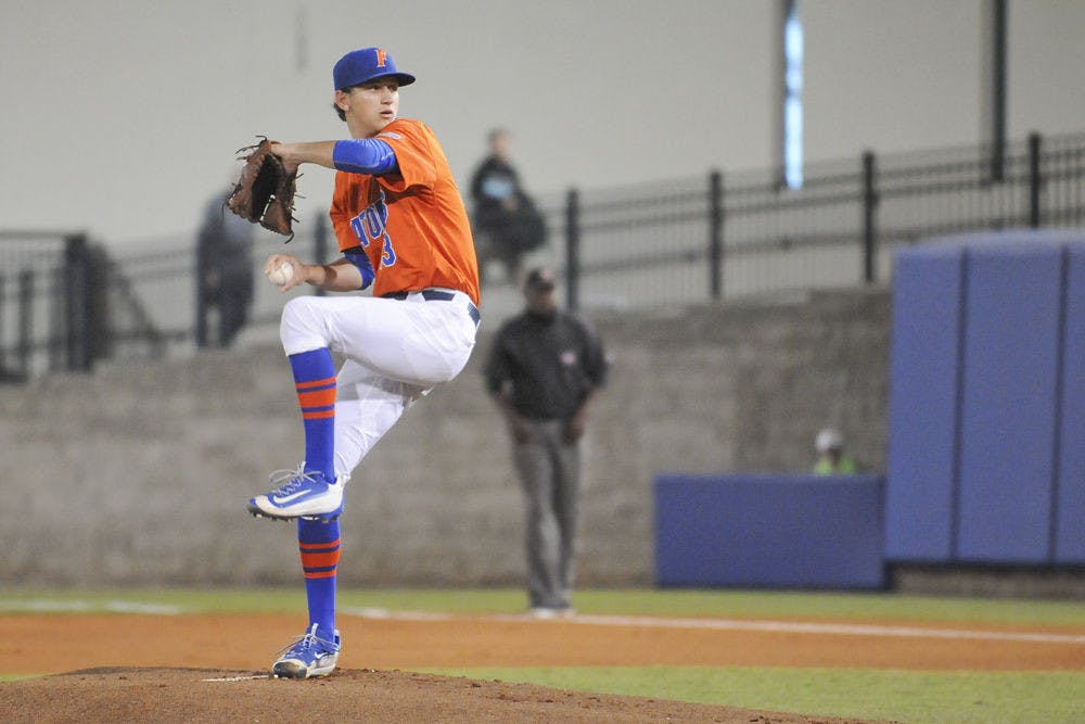 <p>Jackson Kowar pitches during Florida's 5-4 win over UNF on March 9 at McKethan Stadium.</p>