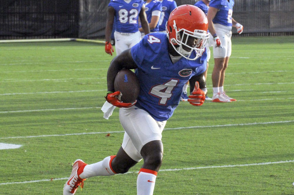<p>UF wide receiver Brandon Powell runs a route during practice on Aug. 31, 2015, at the Sanders Practice Field.</p>