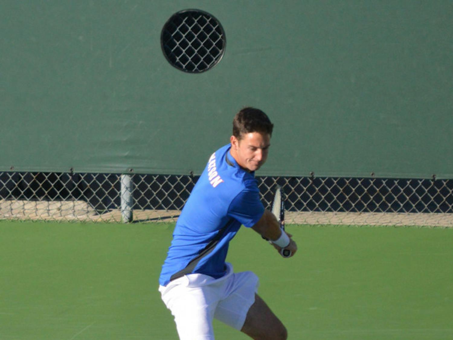 Sophomore Gordon Watson hits the ball during Florida's 5-2 win against North Florida on Jan. 22.