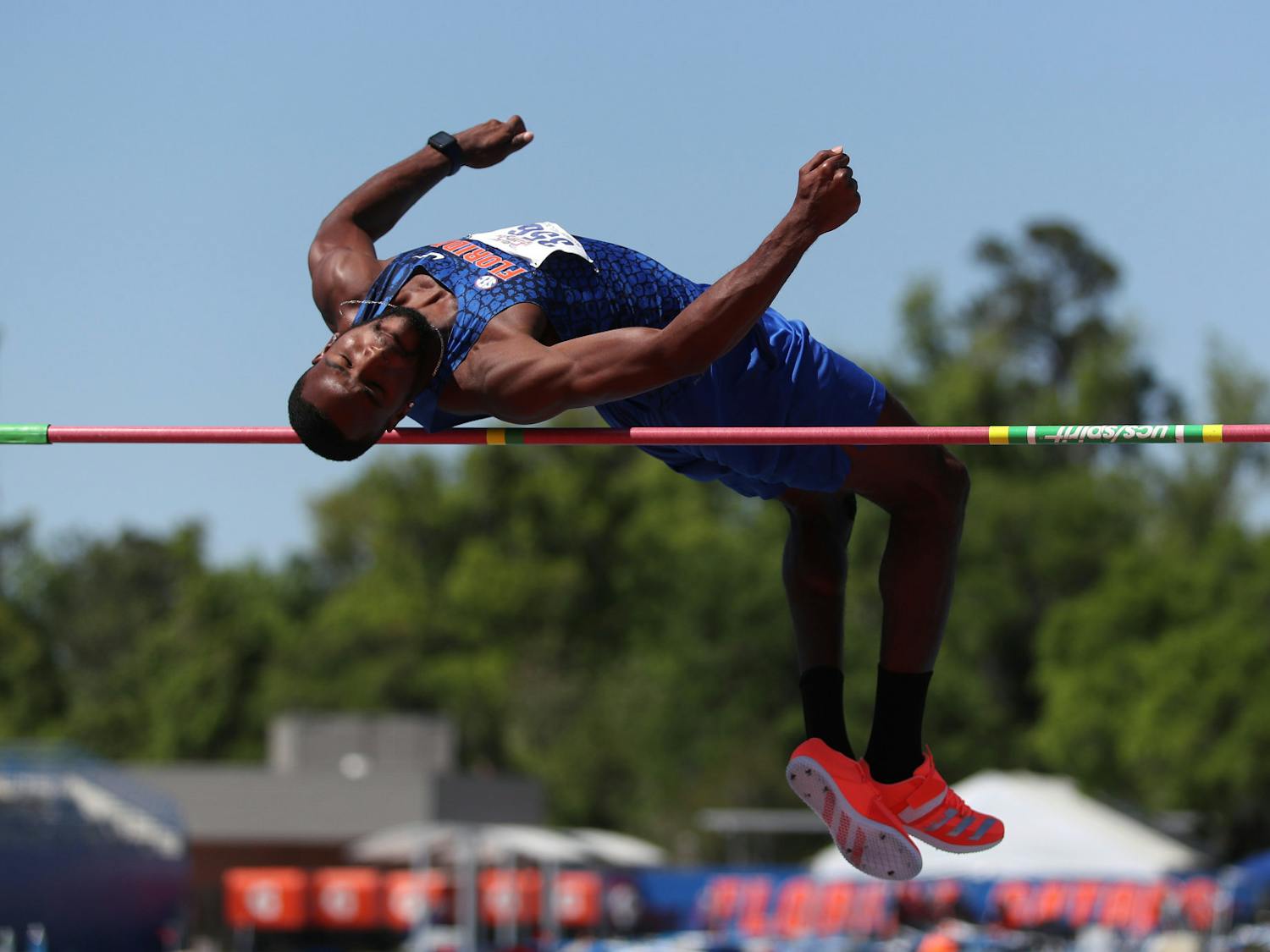 Clayton Brown vaults himself over the bar in the high jump during the Pepsi Florida Relays on Friday, April 2, 2021 at Percy Beard Track at James G. Pressly Stadium in Gainesville, Fla. / UAA Communications photo by Courtney Culbreath
