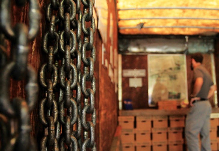 Andy Bachmann, a minister at the United Church of Gainesville, visits the Modern Day Slavery Museum held Thursday on the Plaza of the Americas.