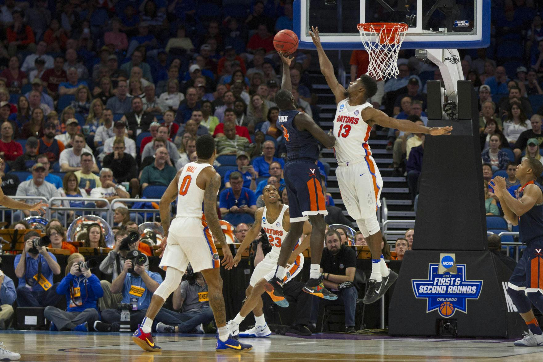 Florida center Kevarrius Hayes attempts to block a shot&nbsp;in Florida's 65-39 win over Virginia in the Round of 32 in the NCAA Tournament on Saturday in Orlando.&nbsp;