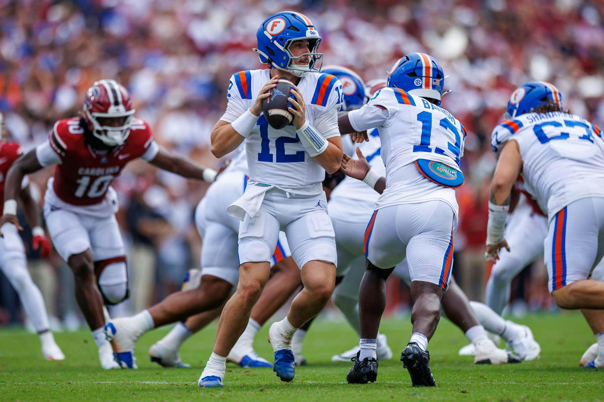 Florida quarterback Aaron Philo (12) looks to pass during the first half of an NCAA college football game against South Carolina, Saturday, Oct. 10, 2026, in Gainesville, Fla.