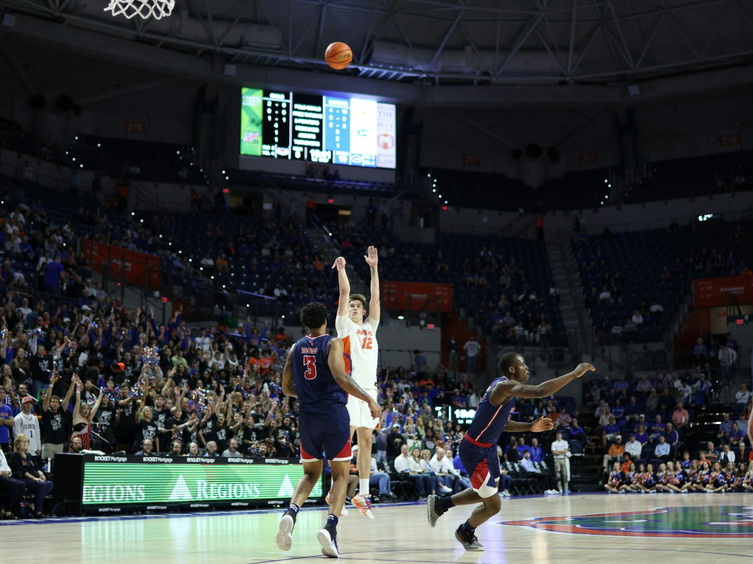 Florida forward Colin Castleton shoots a 3-pointer against the Florida Atlantic Owls Monday, Nov. 14. Castleton scored 30 or more points for the second straight game in the loss to FAU.