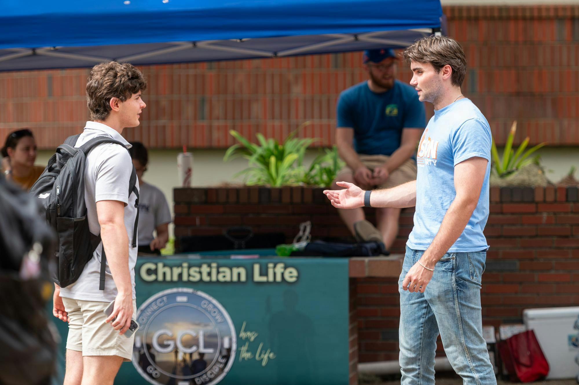 Members of the Vision Party campaign to students around the UF campus in Gainesville, Fla., on Tuesday, Sept. 30, 2025. This is the first election in recent years in which only one party is running.