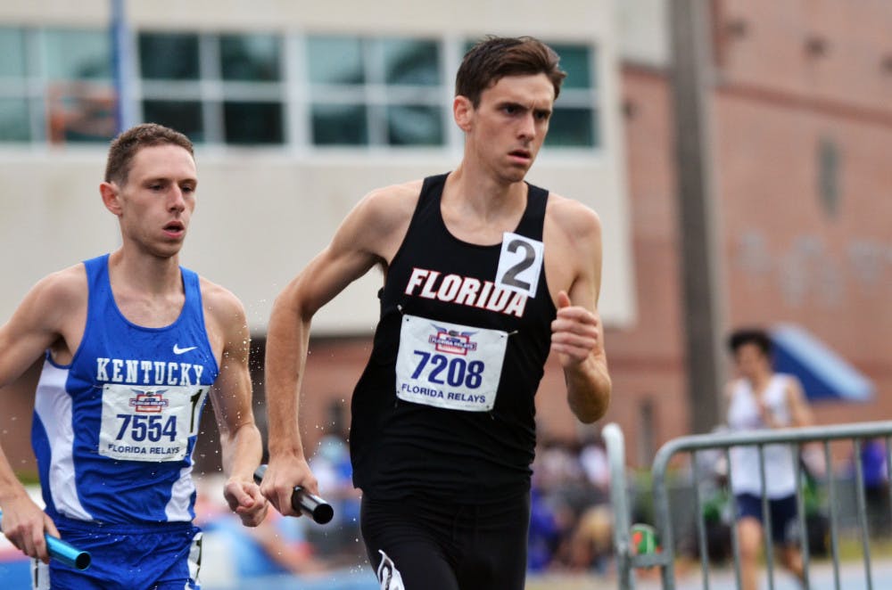 <p>UF's Mark Parrish races in the final leg of the men's distance medley relay during the Florida Relays on May 4, 2015, at the Percy Beard Track in Gainesville.</p>