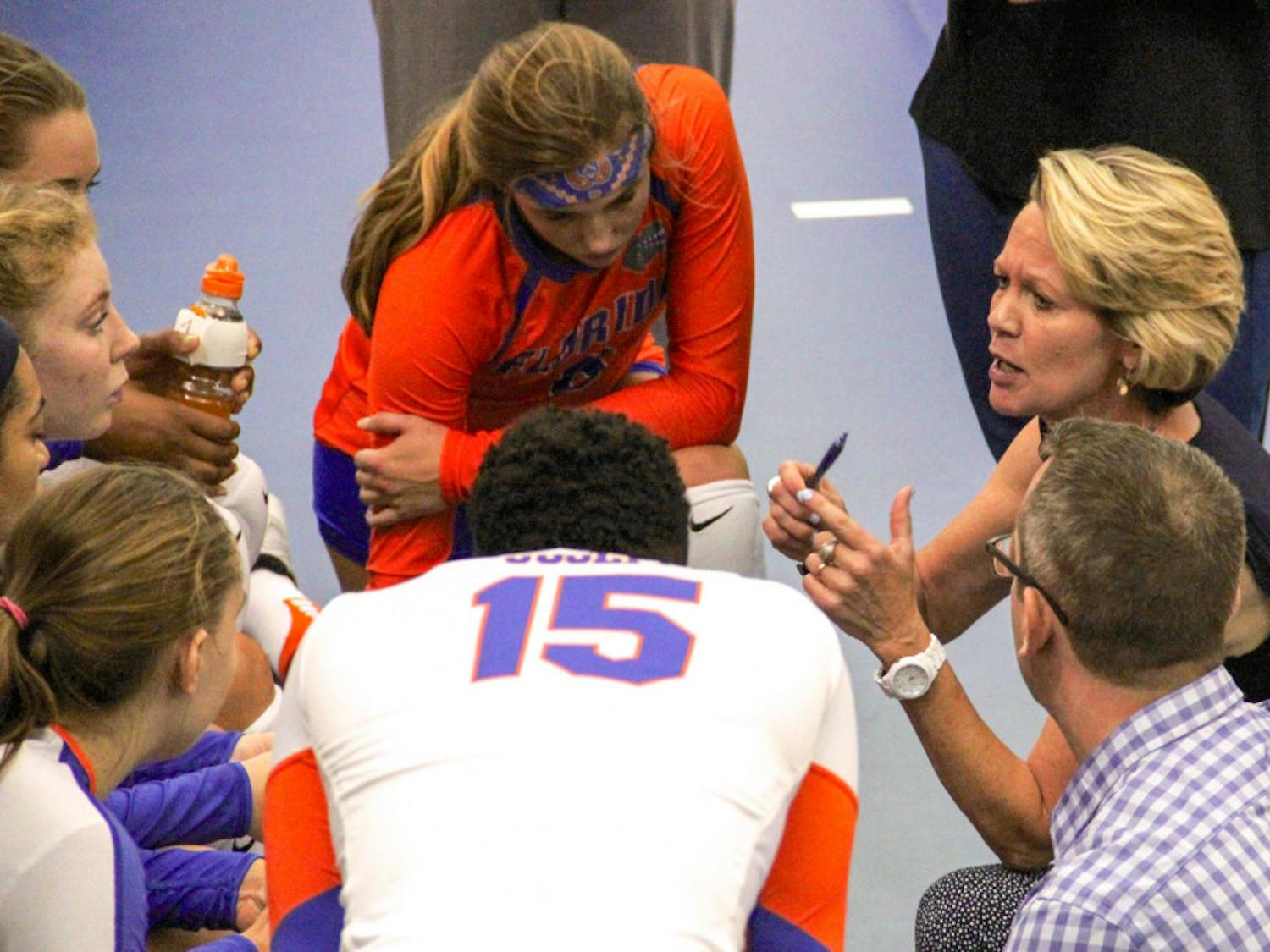 UF coach Mary Wise talks with her players during Florida's 3-1 win over Marshall on Sept. 17, 2016, in the Lemerand Athletic Center.  
