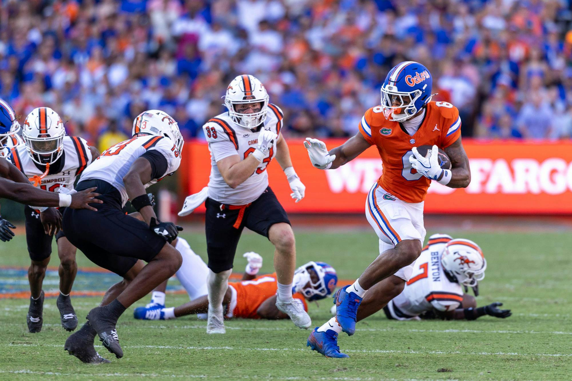 Florida wide receiver Dallas Wilson (6) runs with the ball in the first half of an NCAA college football game against Campbell, Saturday, Sept. 12, 2026, in Gainesville, Fla.