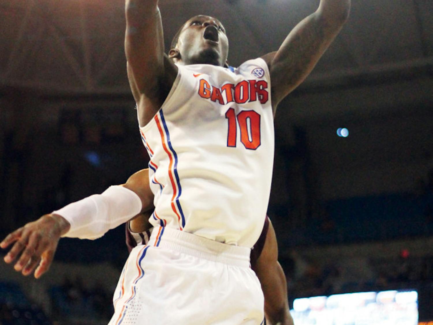 Dorian Finney-Smith attempts a layup during Florida’s 86-56 victory against Arkansas-Little Rock on Saturday in the O’Connell Center.