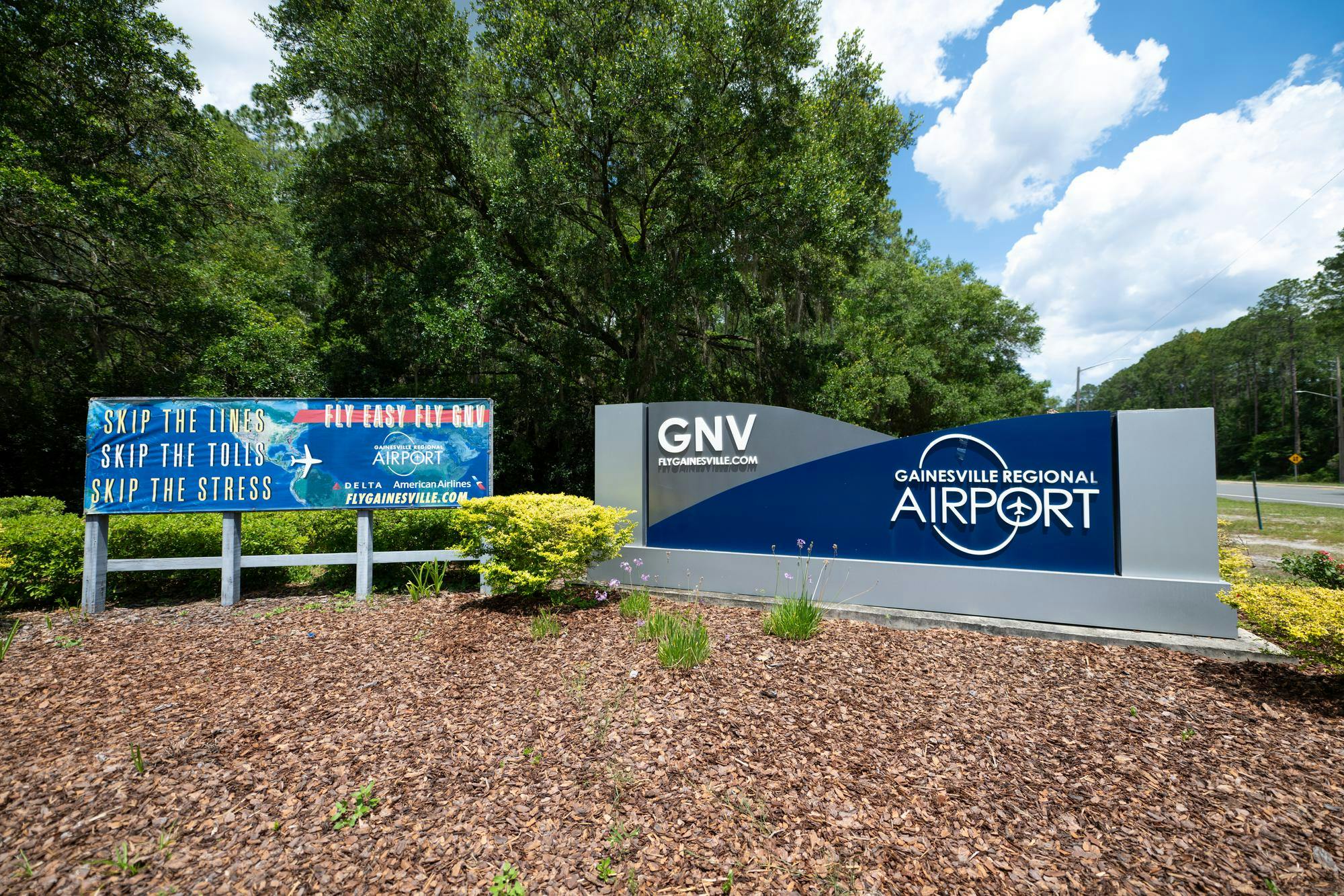 A sign for Gainesville Regional Airport stands along NE 39th Avenue.