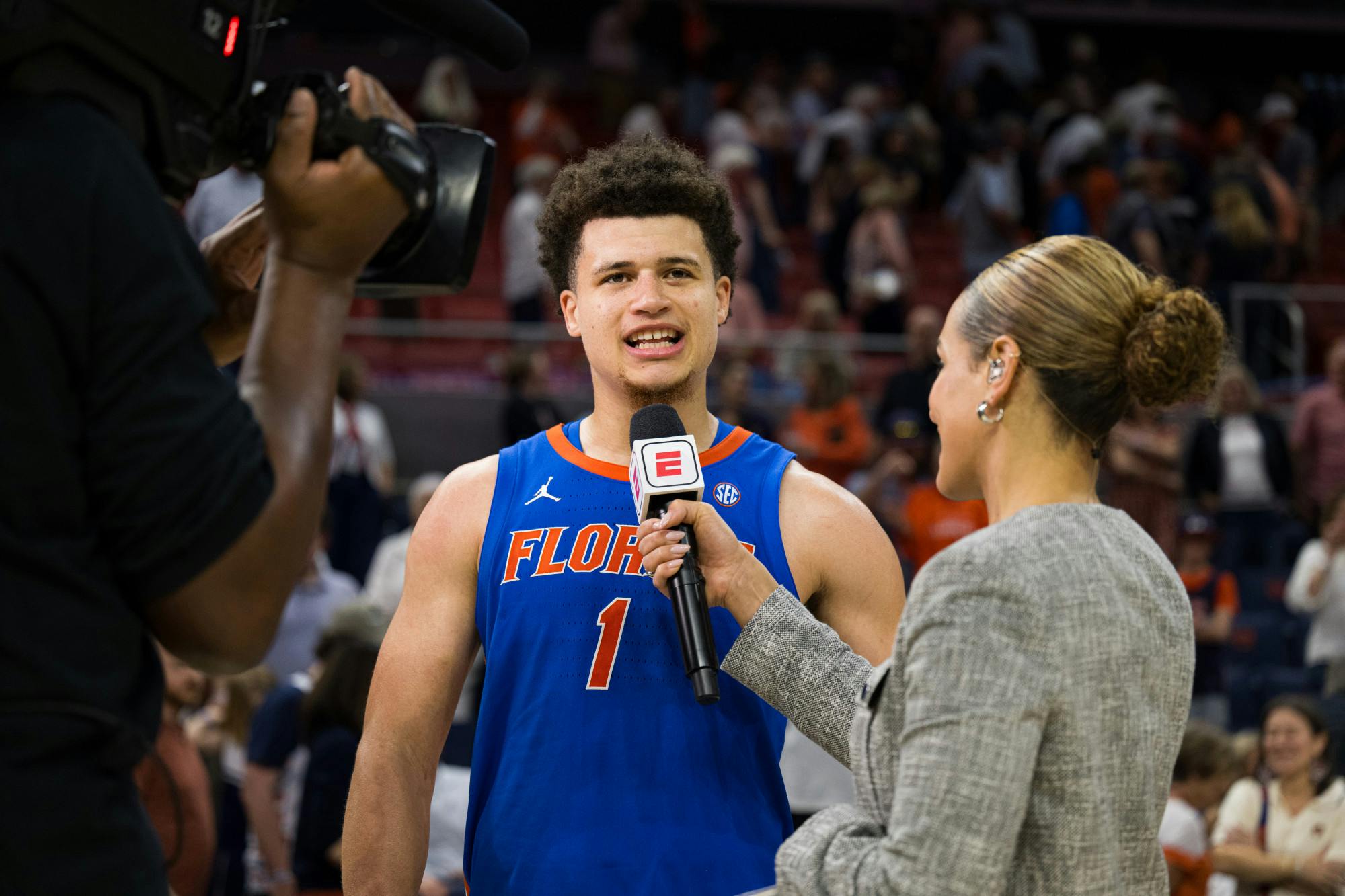 Florida Gators guard Walter Clayton Jr. (1) takes a post game interview with ESPN after the Gators win a basketball game against Auburn University on Feb. 8, 2025, in Auburn, Ala.