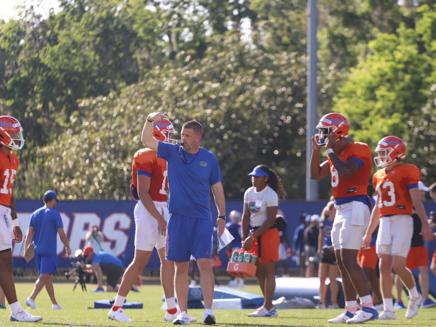 Head football coach Billy Napier calls his team during a spring practice March 29, 2022.
