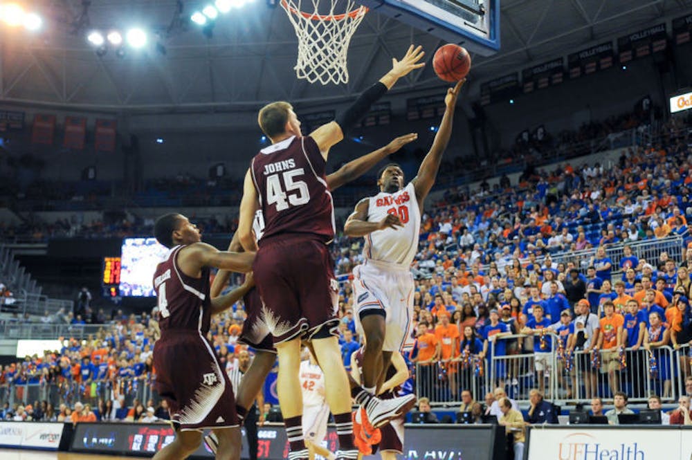 <p>Michael Frazier II attempts a layup during Florida’s 69-36 win against Texas A&amp;M on Feb. 1 in the O’Connell Center.&nbsp;</p>