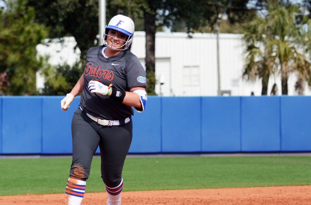 <p>Lauren Haeger rounds the bases after hitting a home run during Florida's 7-1 win against Kansas at Katie Seashole Pressly Stadium.</p>