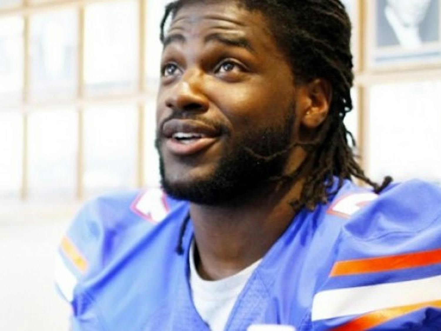 Junior linebacker Ronald Powell (7) answers questions during UF Media Day on Aug. 2. Powell is currently rehabbing an ACL tear in his left knee he suffered during Florida’s spring game on April 7.